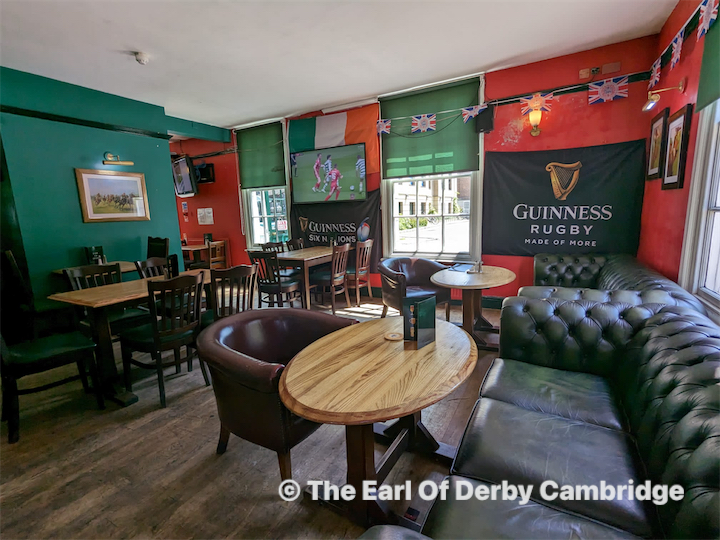 purple lighting and a croud of people